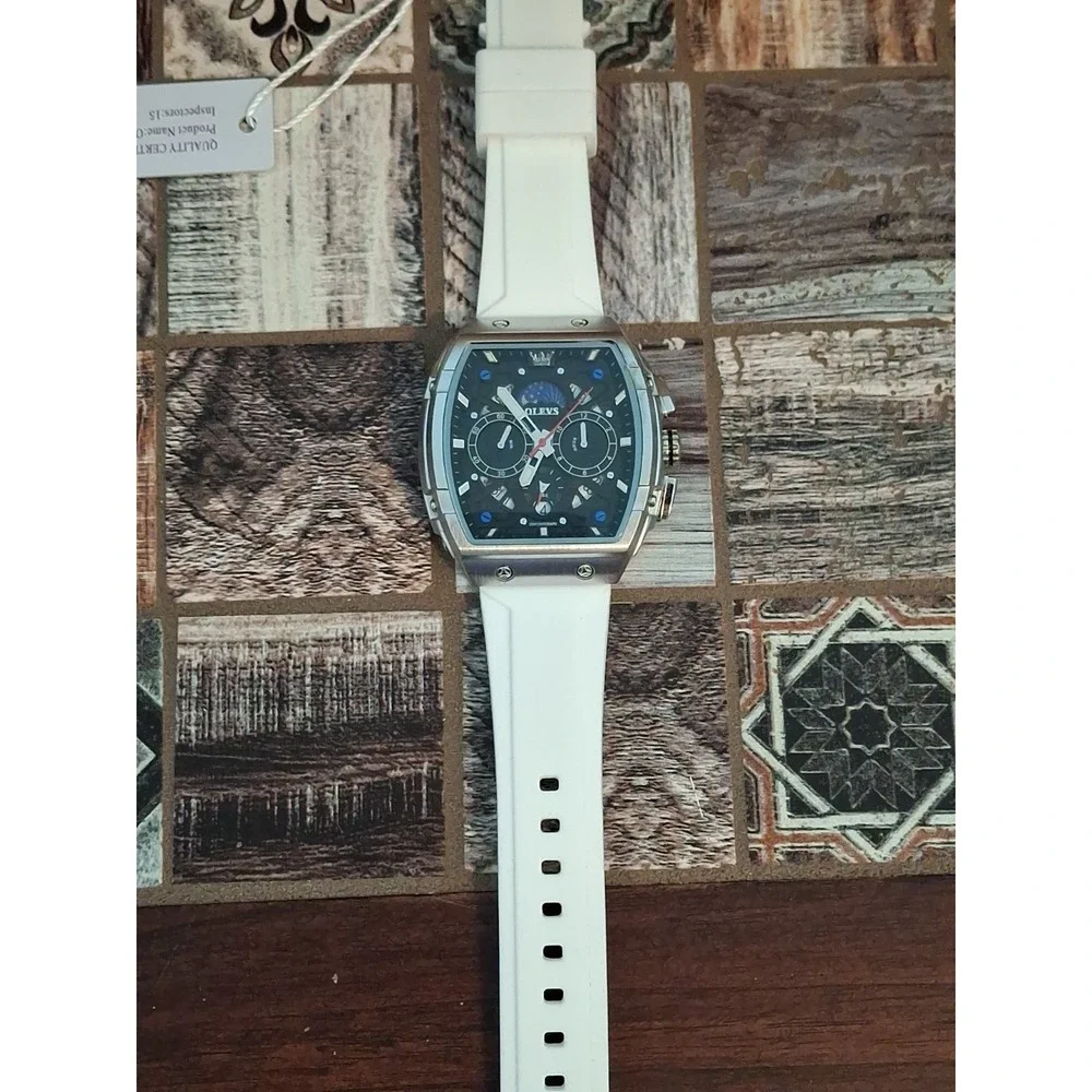 NIB OLEVS 2942G Mens Watch. Chrono W/Moon Phase Calendar,SS Case,White Strap.